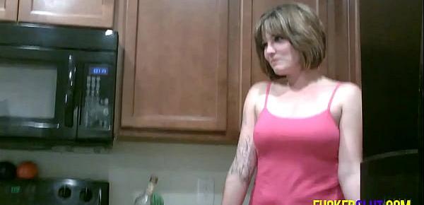  Misty takes naked photos in the kitchen